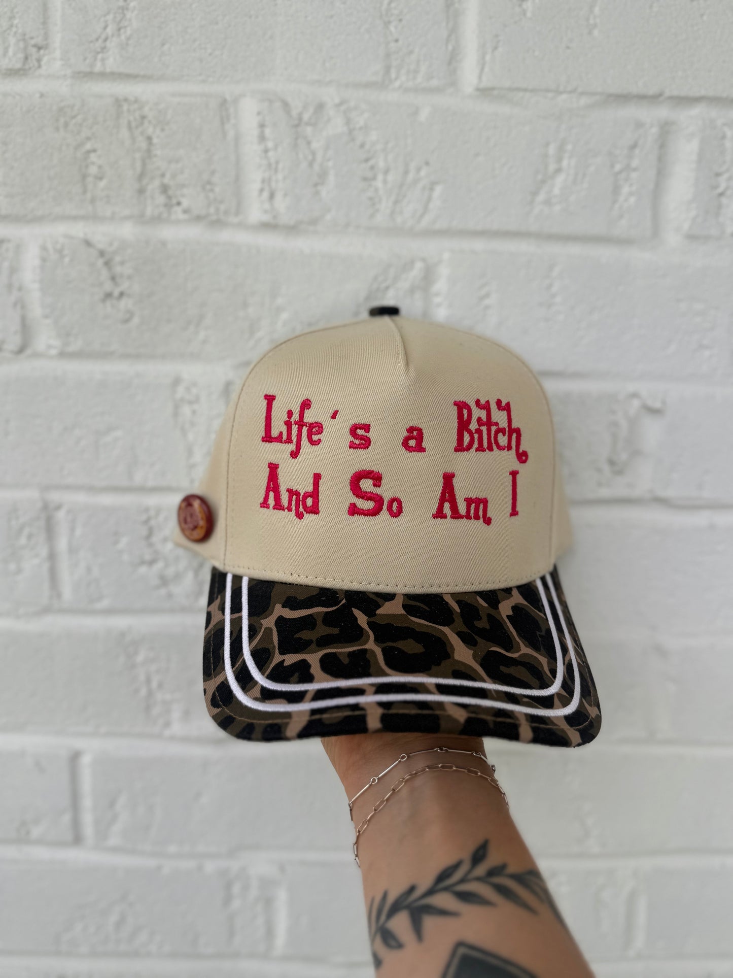 Life’s a Bitch Trucker Hat